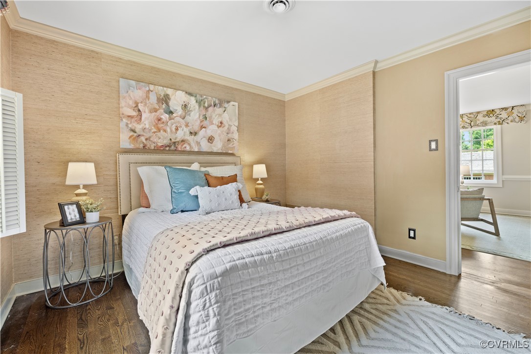 6161 River Road Richmond, VA 23226 - Photo 22 of 38 a bedroom with a bed and wooden floor