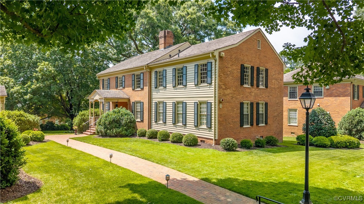 6161 River Road Richmond, VA 23226 - Photo 34 of 38 a front view of a house with a yard and porch