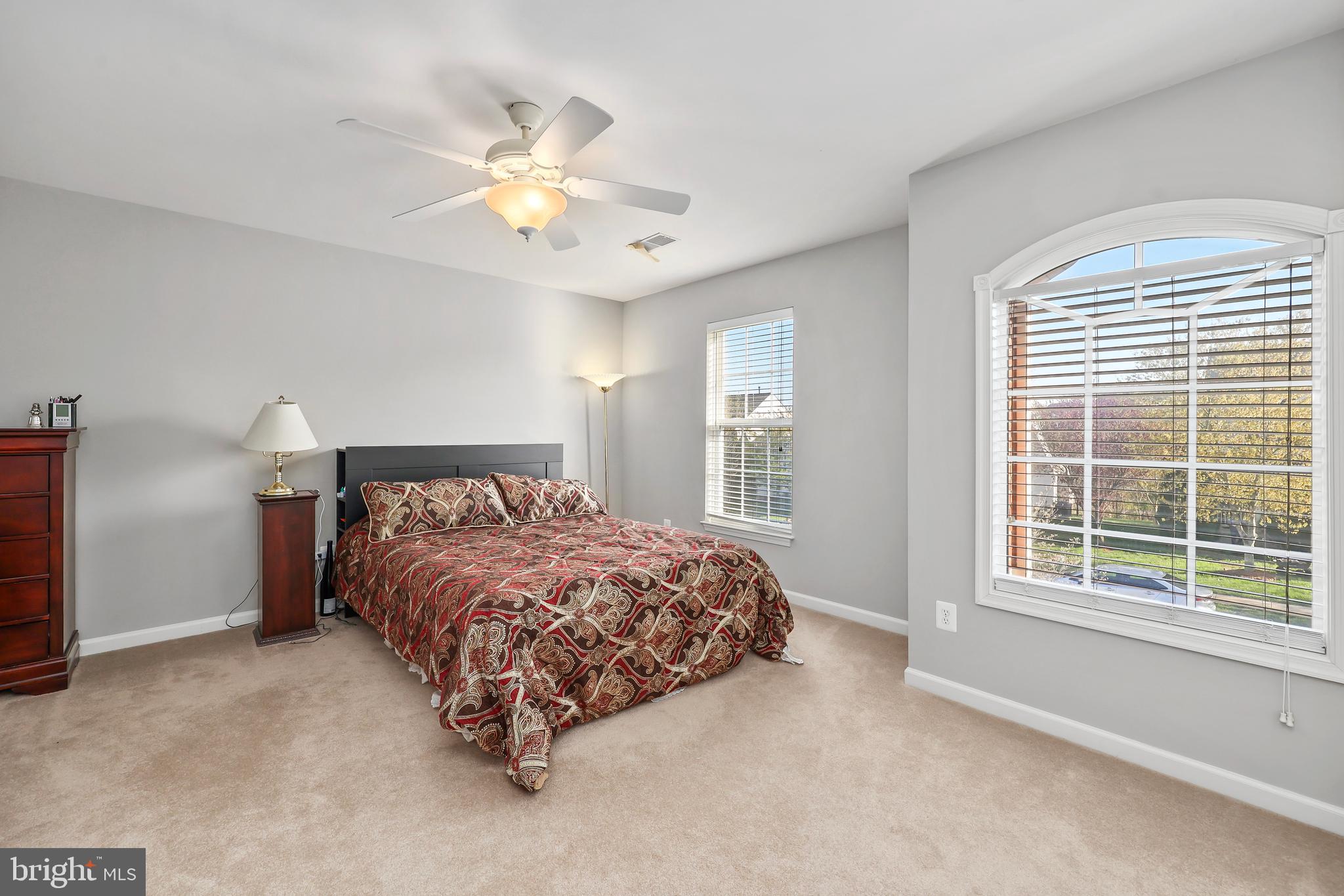 41742 Experience Way Aldie, VA 20105 - Photo 25 of 78 a bedroom with a bed and a window