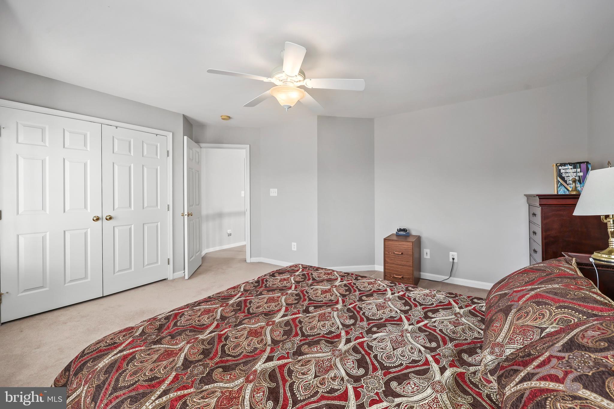 41742 Experience Way Aldie, VA 20105 - Photo 27 of 78 a bedroom with a bed and dresser