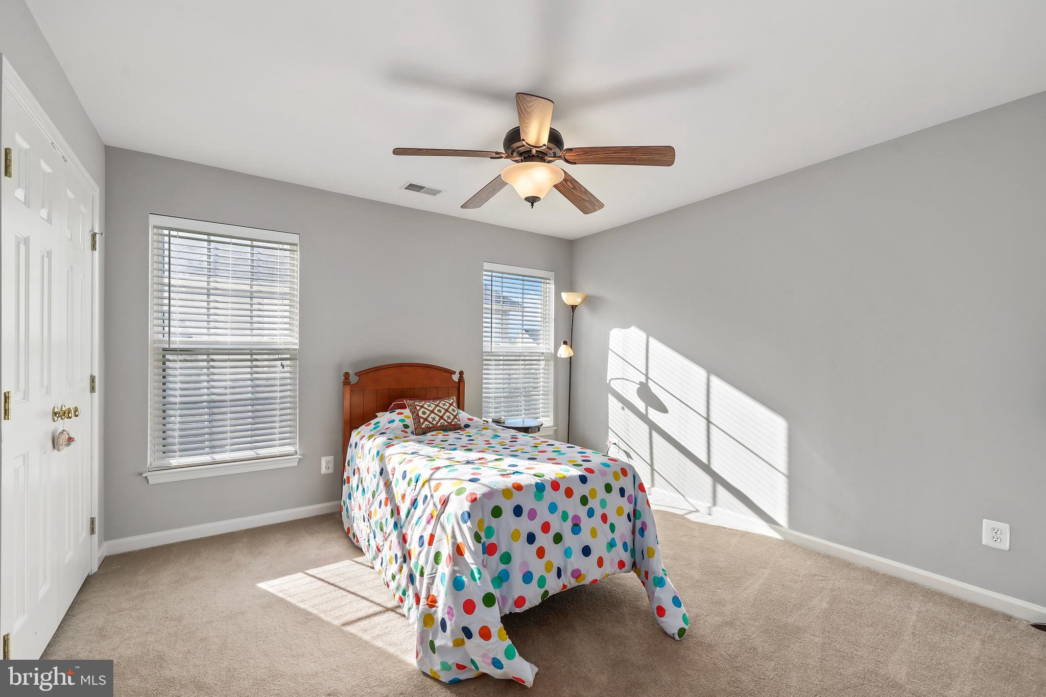 41742 Experience Way Aldie, VA 20105 - Photo 30 of 78 a bedroom with a bed and a window
