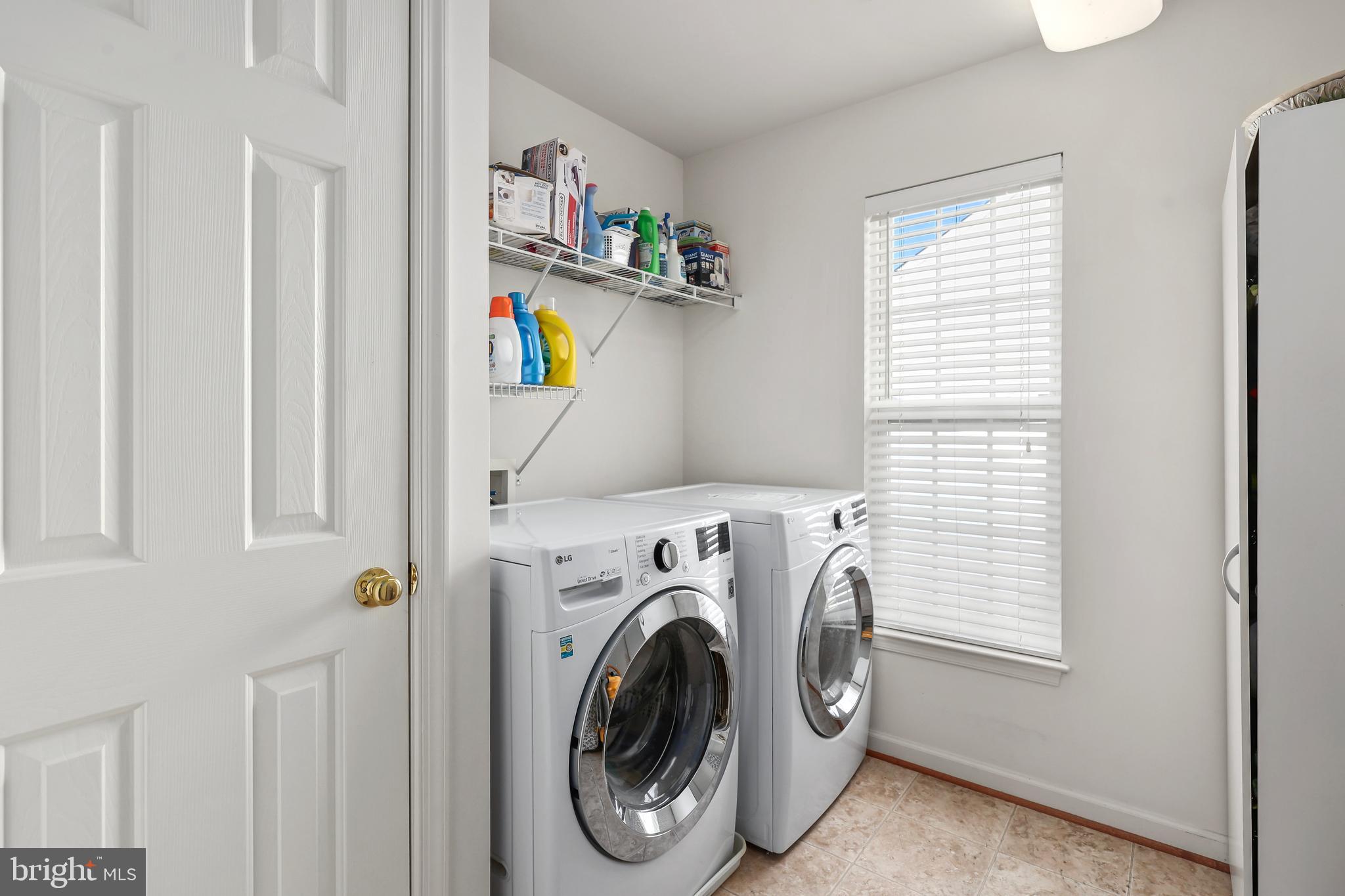 41742 Experience Way Aldie, VA 20105 - Photo 33 of 78 a view of storage and utility room with washer and dryer