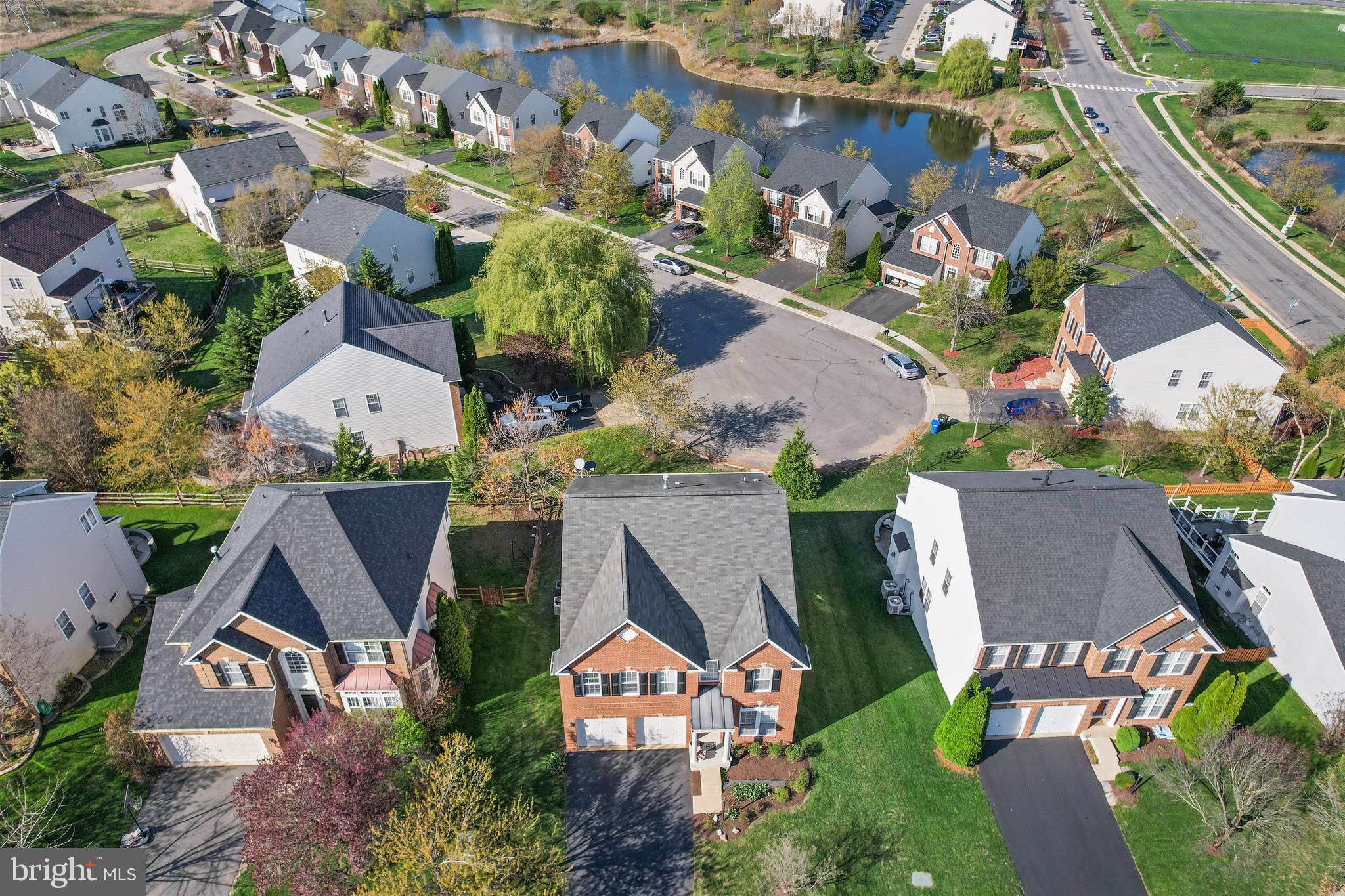 41742 Experience Way Aldie, VA 20105 - Photo 52 of 78 an aerial view of multiple houses with yard