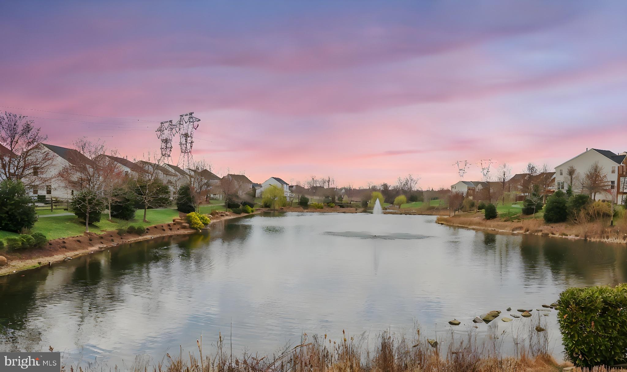 41742 Experience Way Aldie, VA 20105 - Photo 59 of 78 a view of a lake with houses in the back