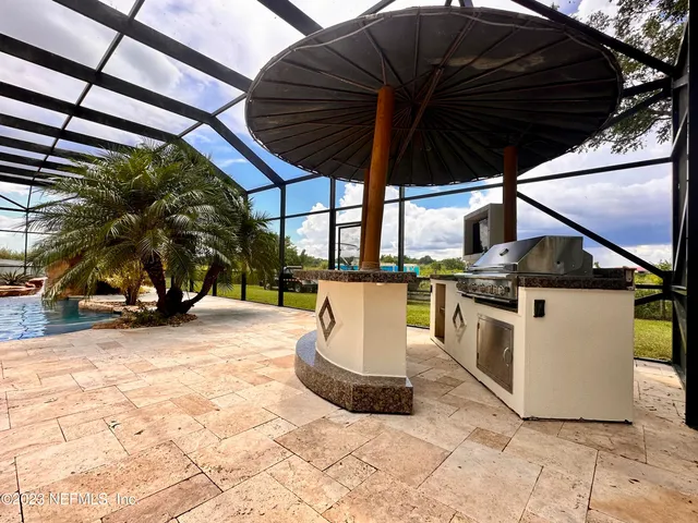 a table and chairs in a patio