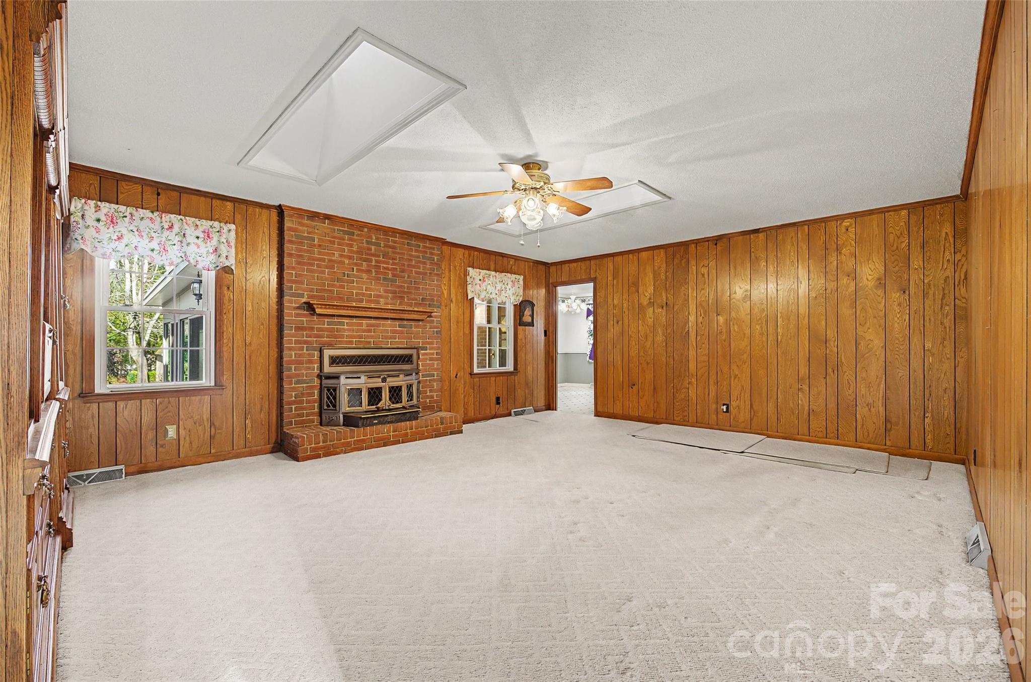 164 Foxcroft Road Rock Hill, SC 29732 - Photo 13 of 35 an empty room with windows and fireplace