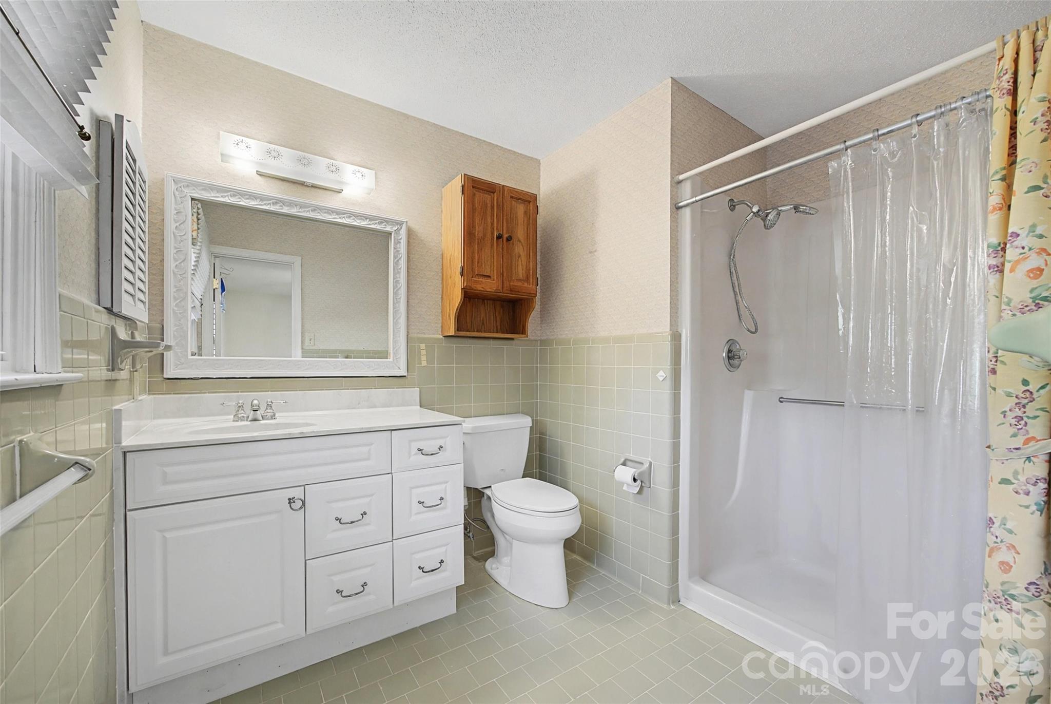 164 Foxcroft Road Rock Hill, SC 29732 - Photo 21 of 35 a bathroom with a double vanity sink toilet and shower