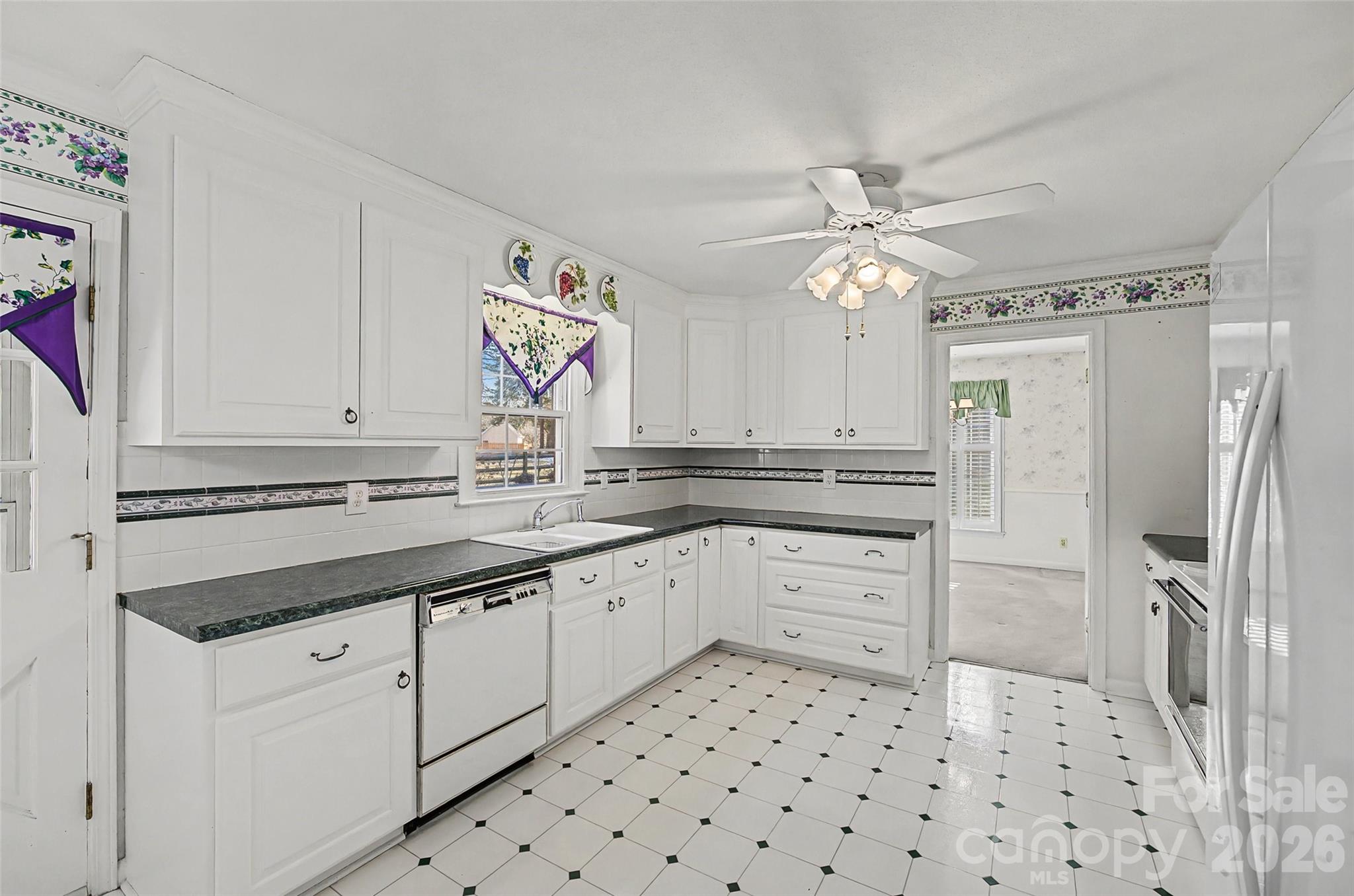 164 Foxcroft Road Rock Hill, SC 29732 - Photo 9 of 35 a kitchen with a sink stove and refrigerator