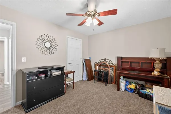 a view of a workspace with furniture