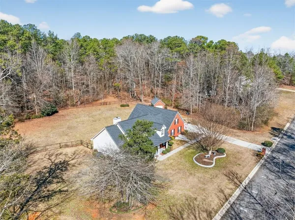 a view of a backyard of a house