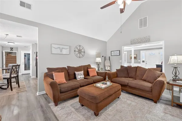 a living room with furniture and a couch