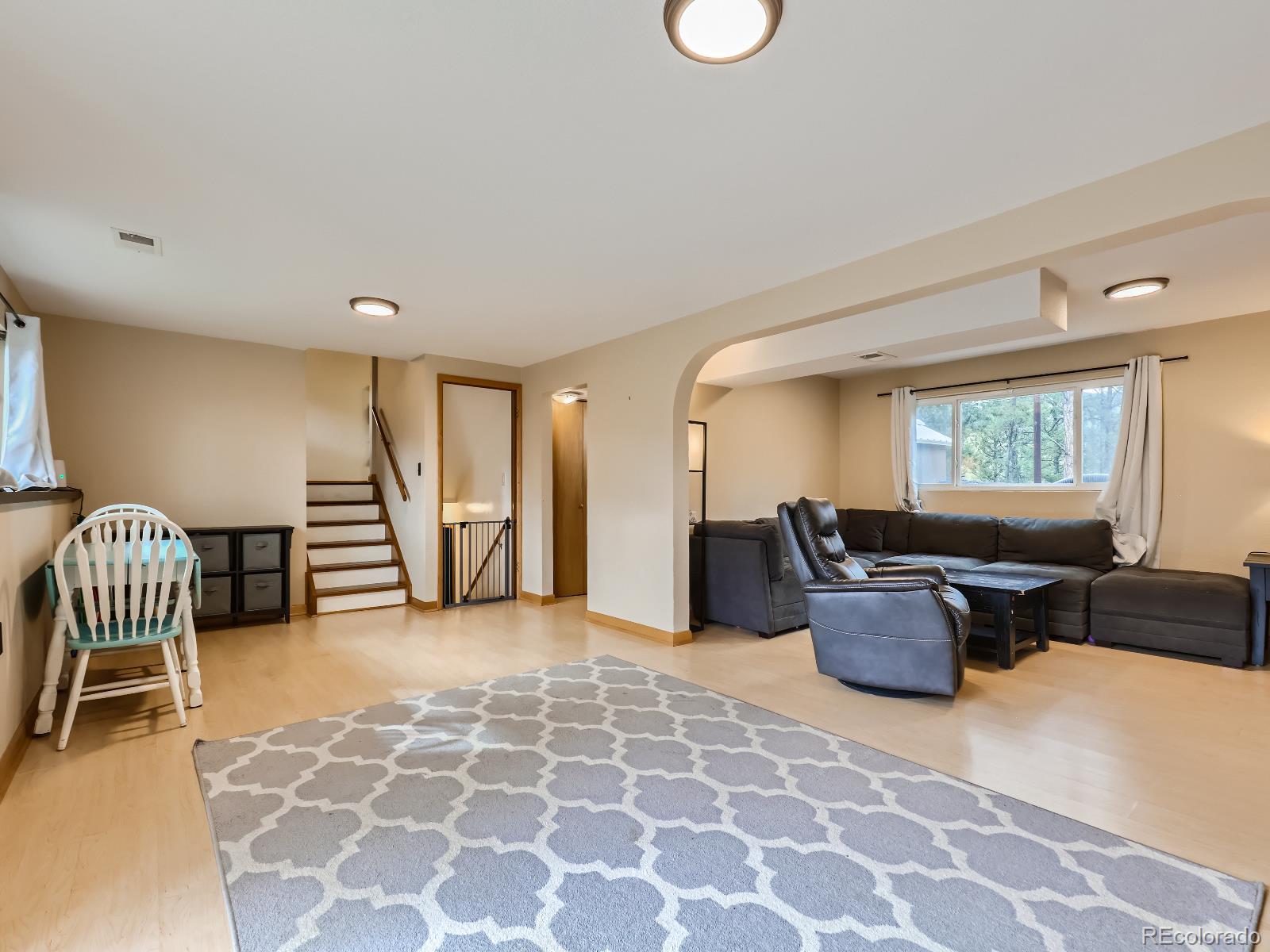 24697 Red Cloud Drive Conifer, CO 80433 - Photo 20 of 28 a living room with furniture and a window