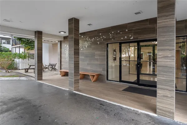 a view of a lobby with a door