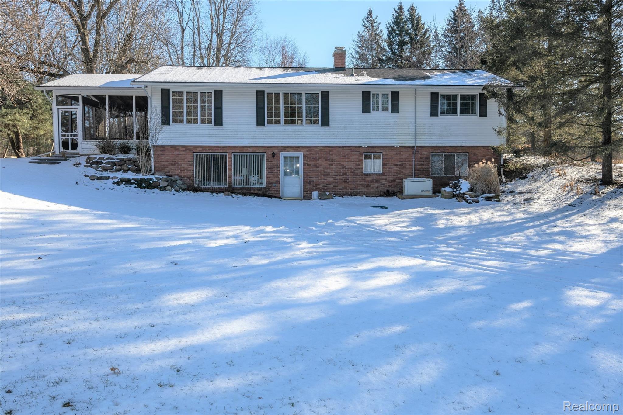 6025 Brighton Road Brighton, MI 48116 - Photo 2 of 46 Back lighter.jpg