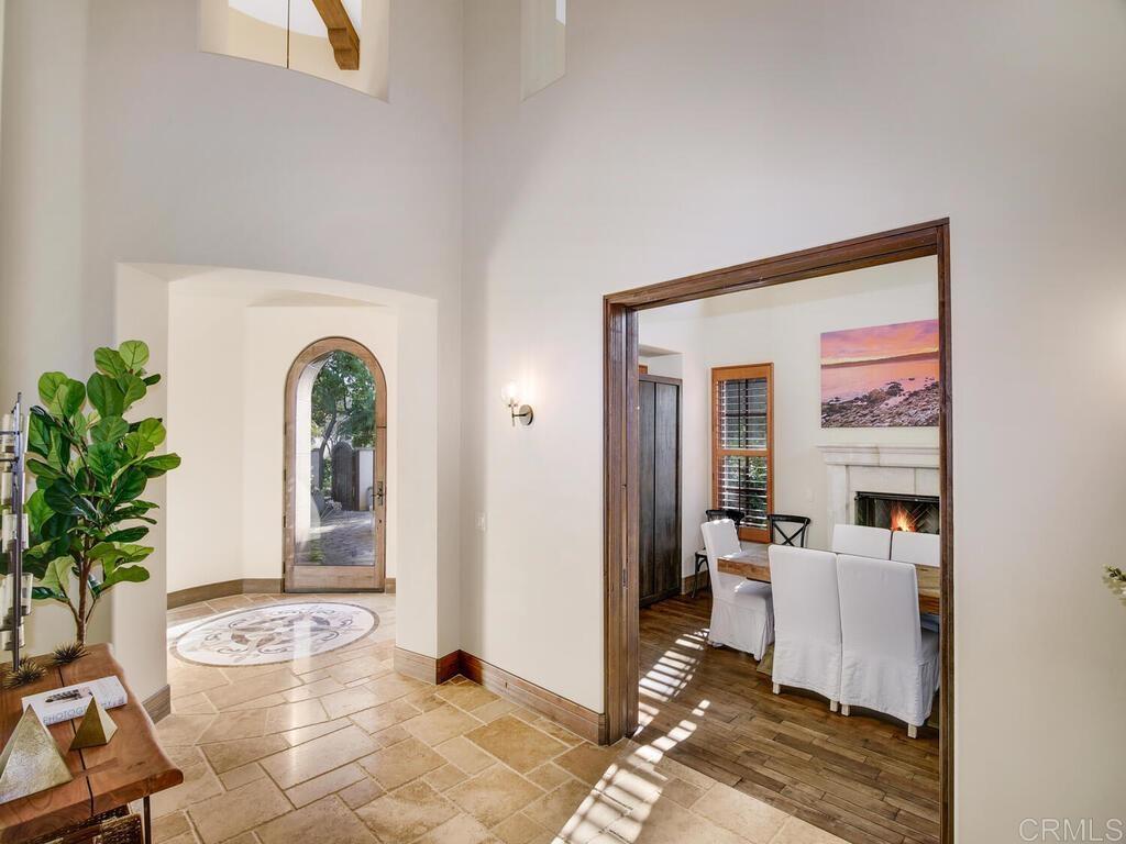 4272 Via Ravello Rancho Santa Fe, CA 92091 - Photo 9 of 58 a living room with furniture and a potted plant