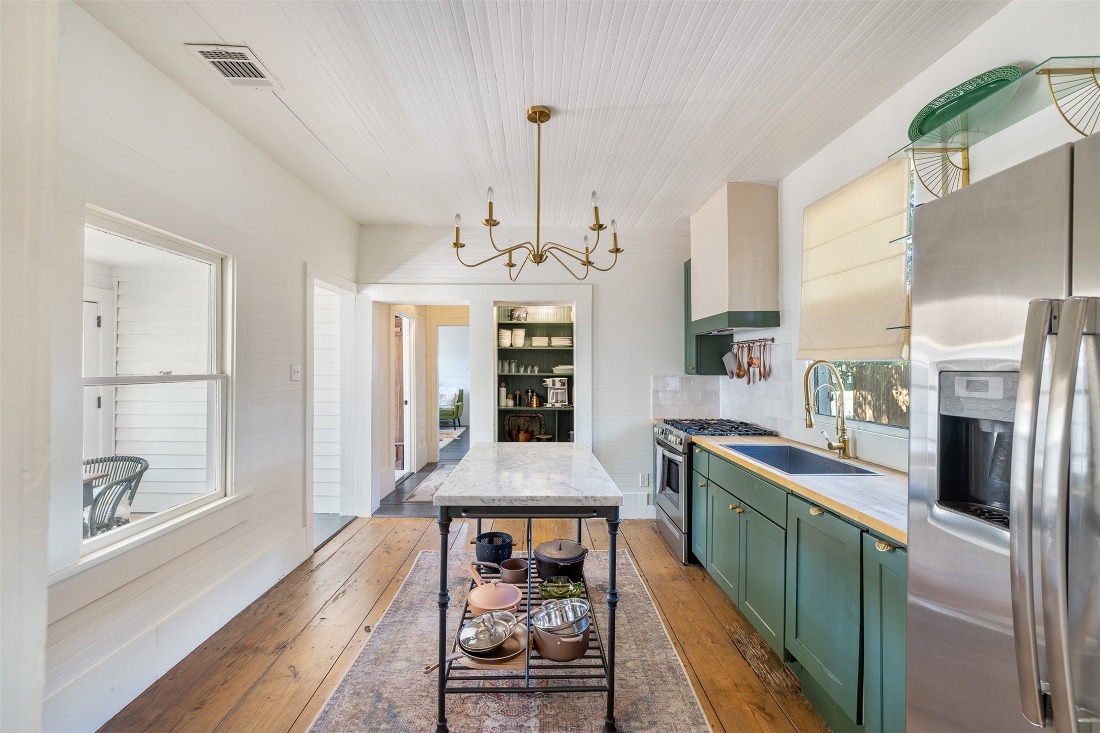 206 North Rusk Street Fayetteville, TX 78940 - Photo 14 of 50 a dining room with fireplace and wooden floor