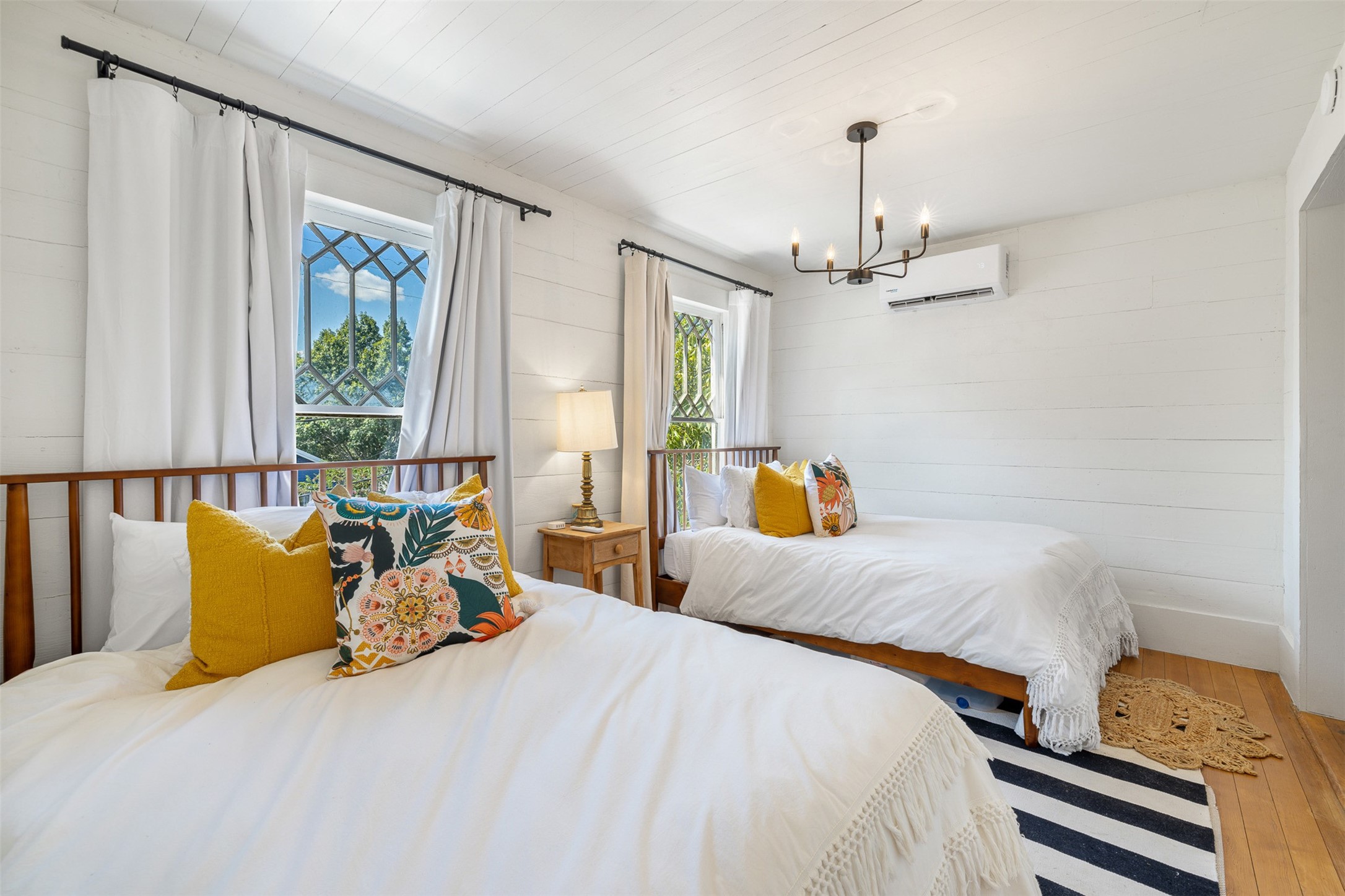 206 North Rusk Street Fayetteville, TX 78940 - Photo 27 of 50 a bedroom with bed and window