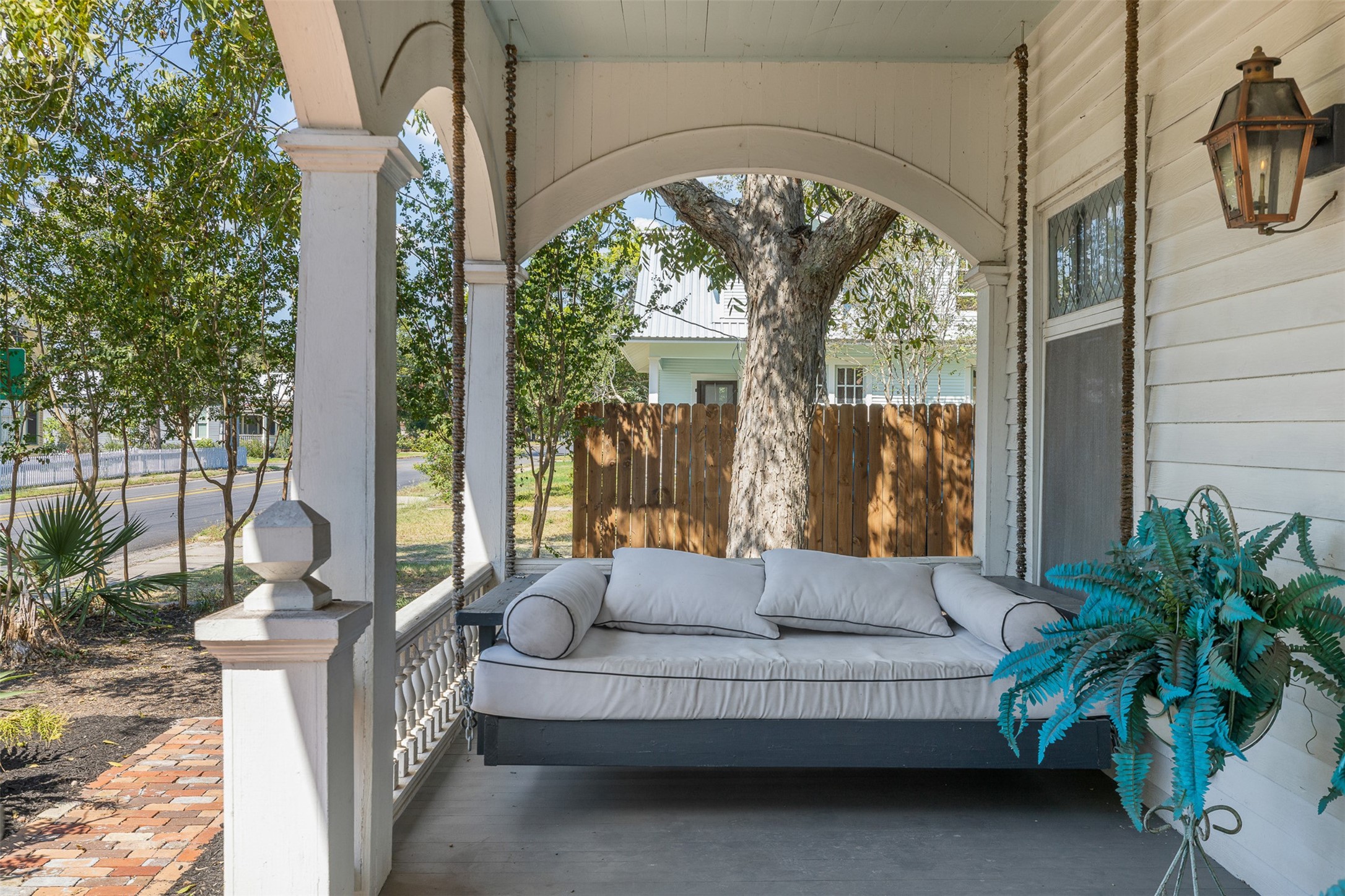 206 North Rusk Street Fayetteville, TX 78940 - Photo 3 of 50 a living room with furniture and a floor to ceiling window