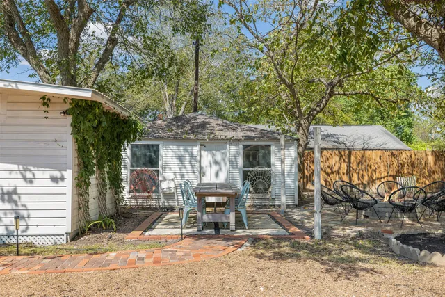 a backyard of a house with seating space