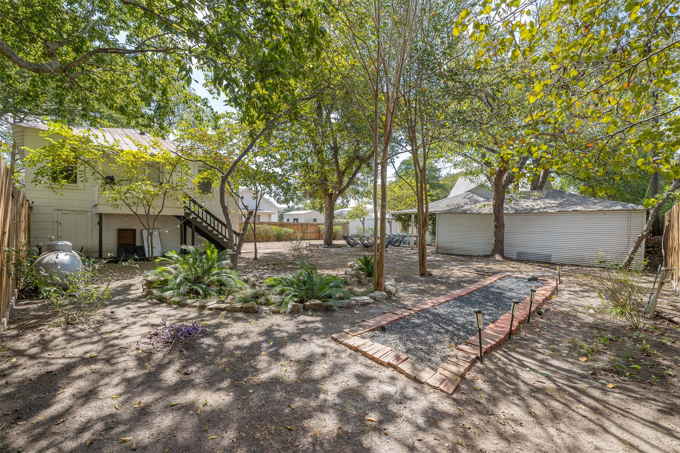 206 North Rusk Street Fayetteville, TX 78940 - Photo 42 of 50 a view of a house with a yard