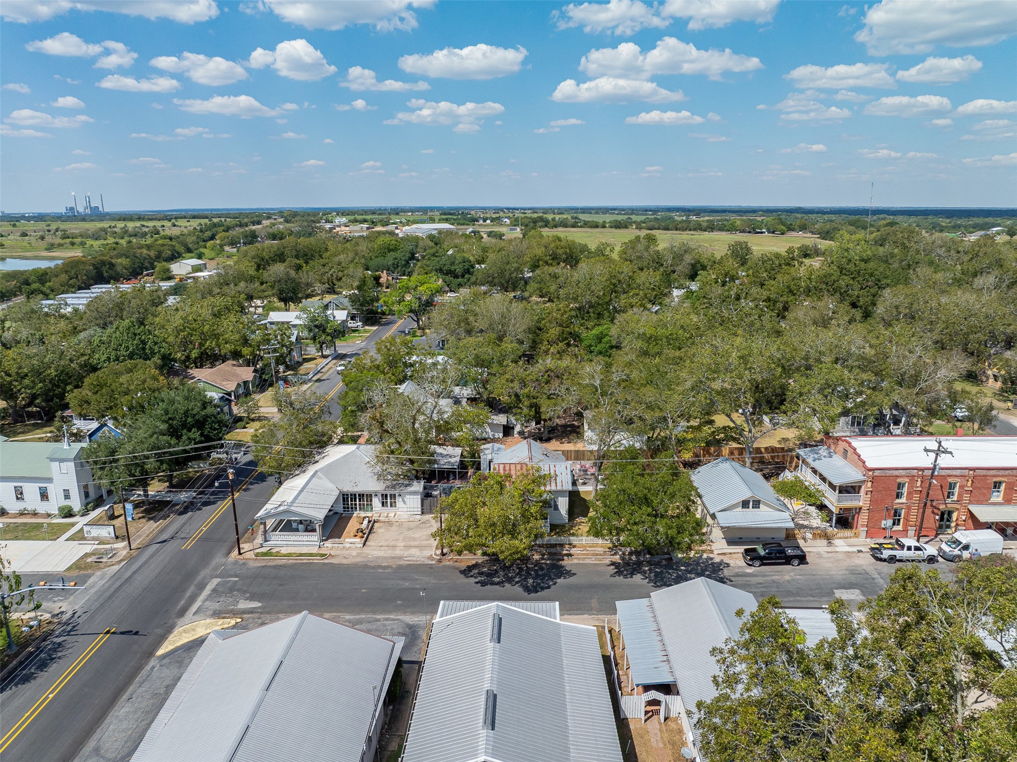 206 North Rusk Street Fayetteville, TX 78940 - Photo 46 of 50 an aerial view of residential houses with outdoor space