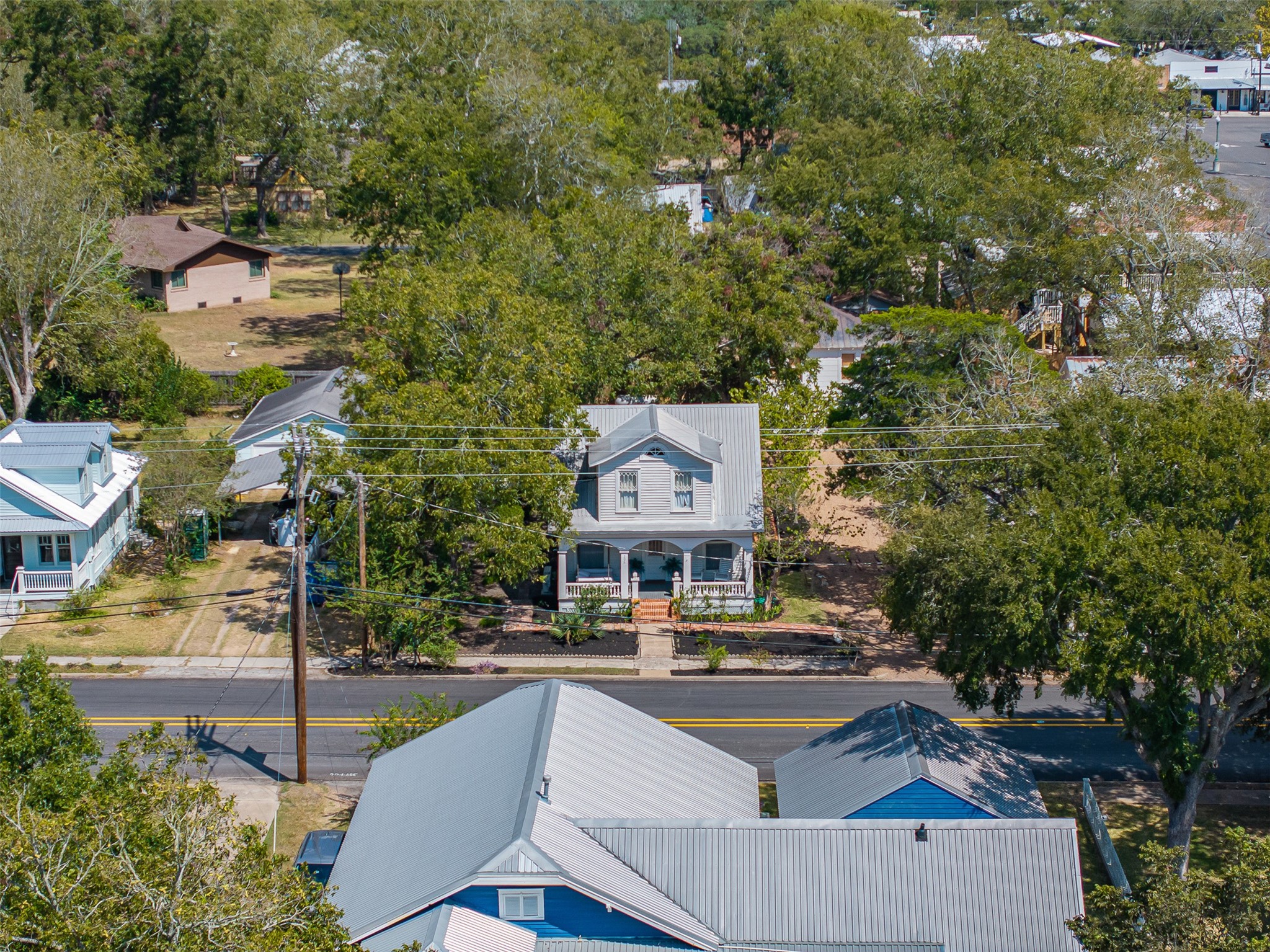 206 North Rusk Street Fayetteville, TX 78940 - Photo 47 of 50 an aerial view of a house with swimming pool and outdoor seating