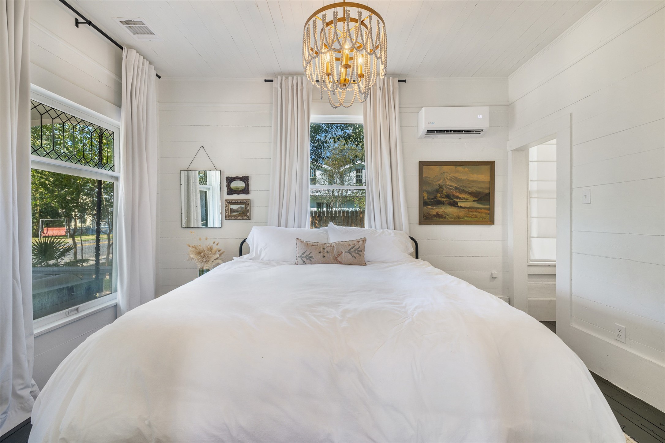 206 North Rusk Street Fayetteville, TX 78940 - Photo 7 of 50 a bedroom with a bed and a window