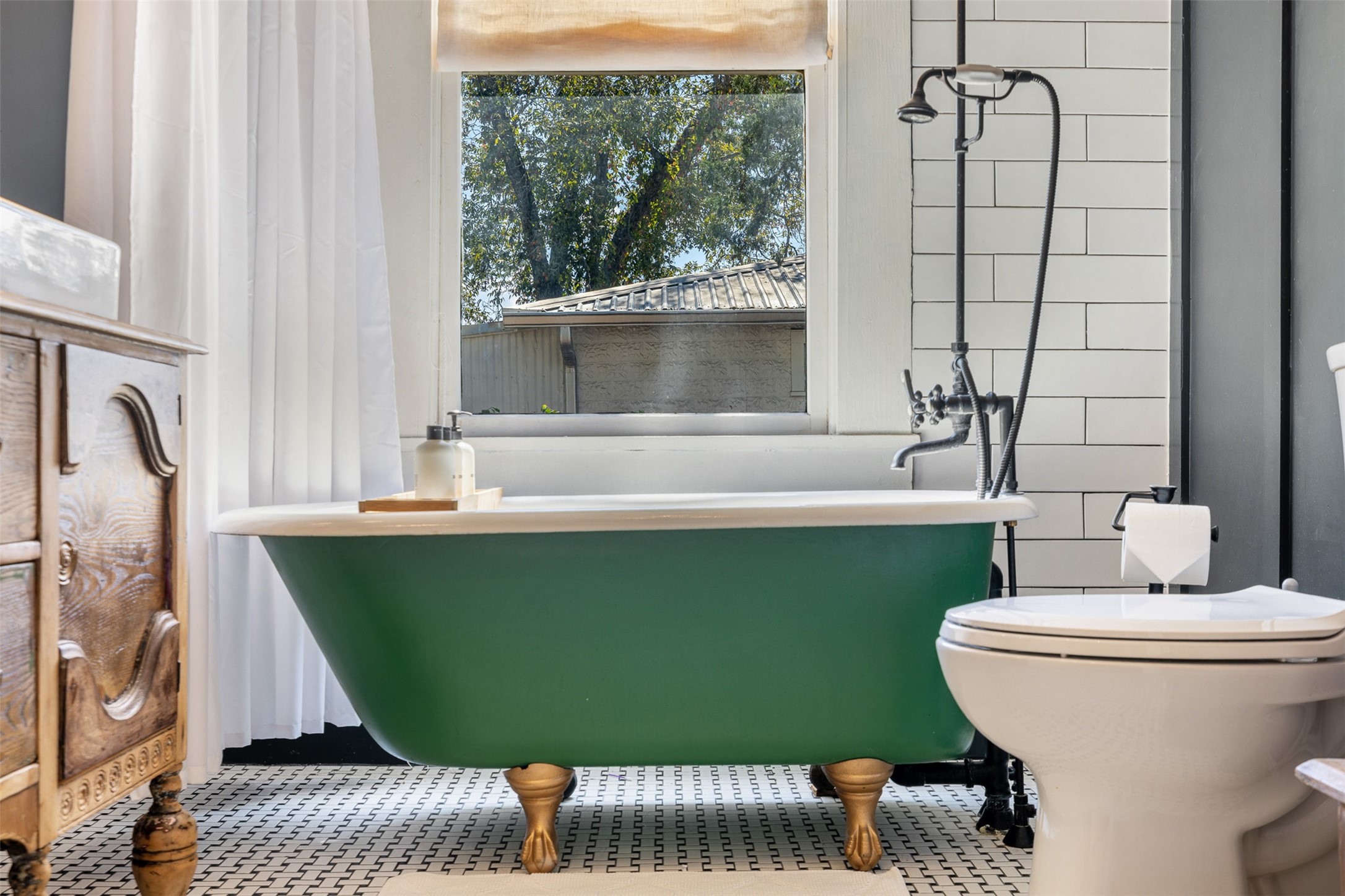 206 North Rusk Street Fayetteville, TX 78940 - Photo 10 of 50 a bathroom with a sink and toilet