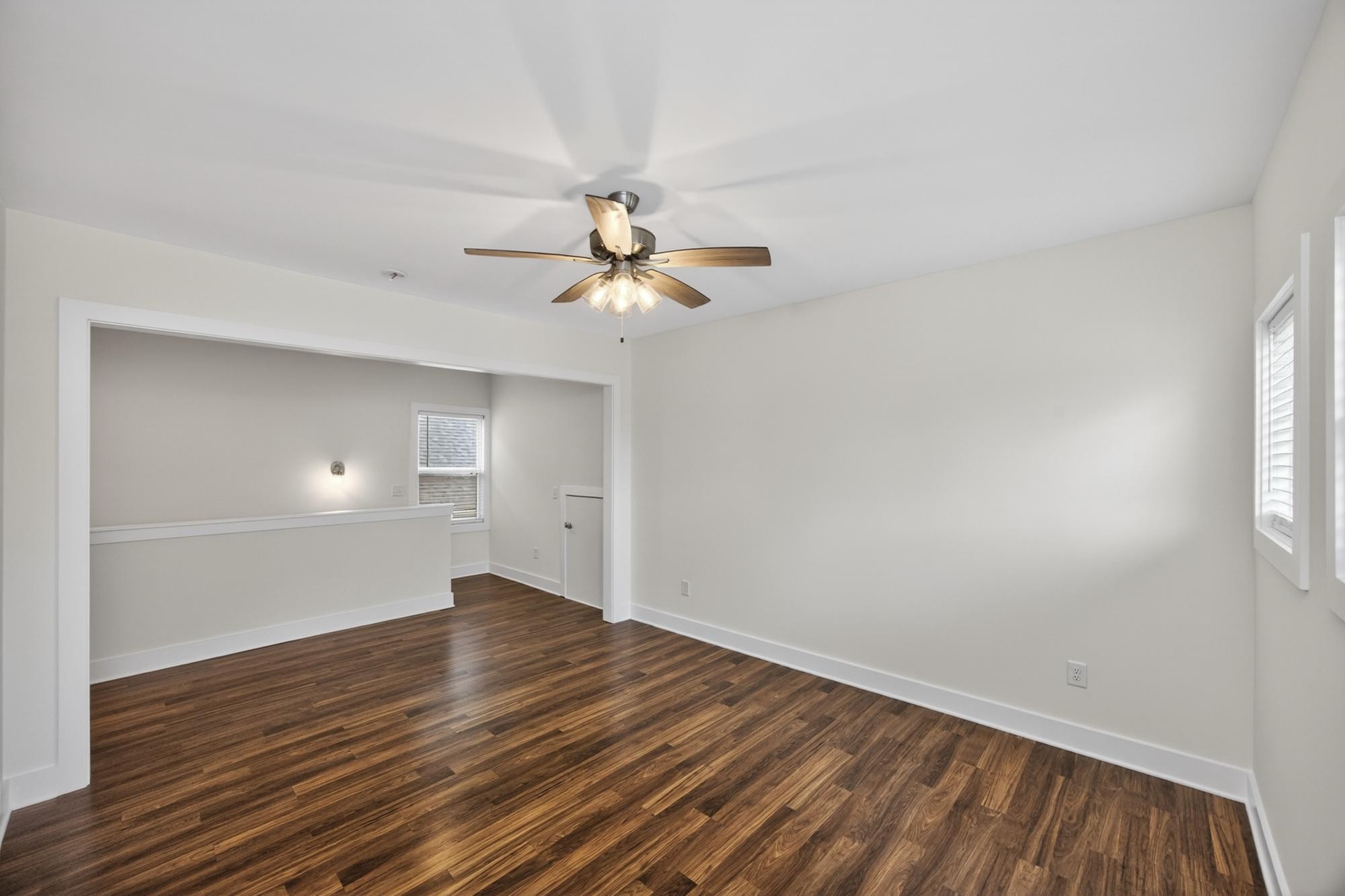 7 Decatur Street Nashville, TN 37210 - Photo 27 of 43 an empty room with wooden floor and windows