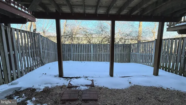 a bench sitting in middle of a yard