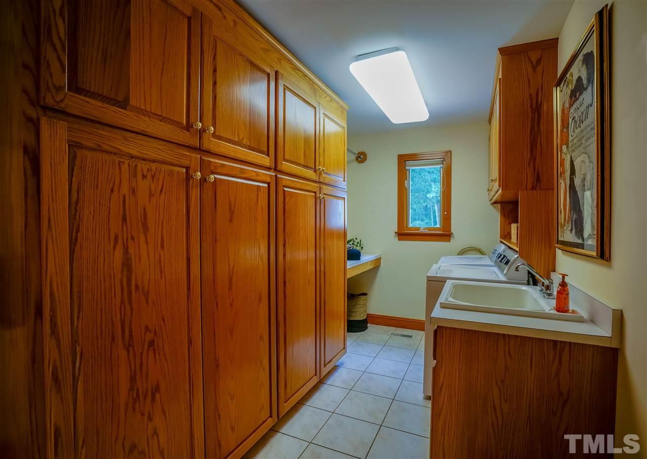 1032 Ridge Drive Clayton, NC 27520 - Photo 11 of 25 a bathroom with a sink and a mirror