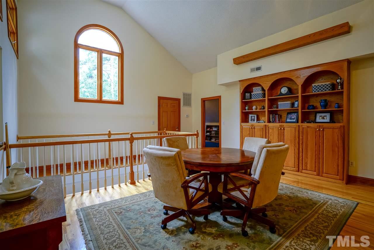 1032 Ridge Drive Clayton, NC 27520 - Photo 12 of 25 a view of a dining room with furniture and window