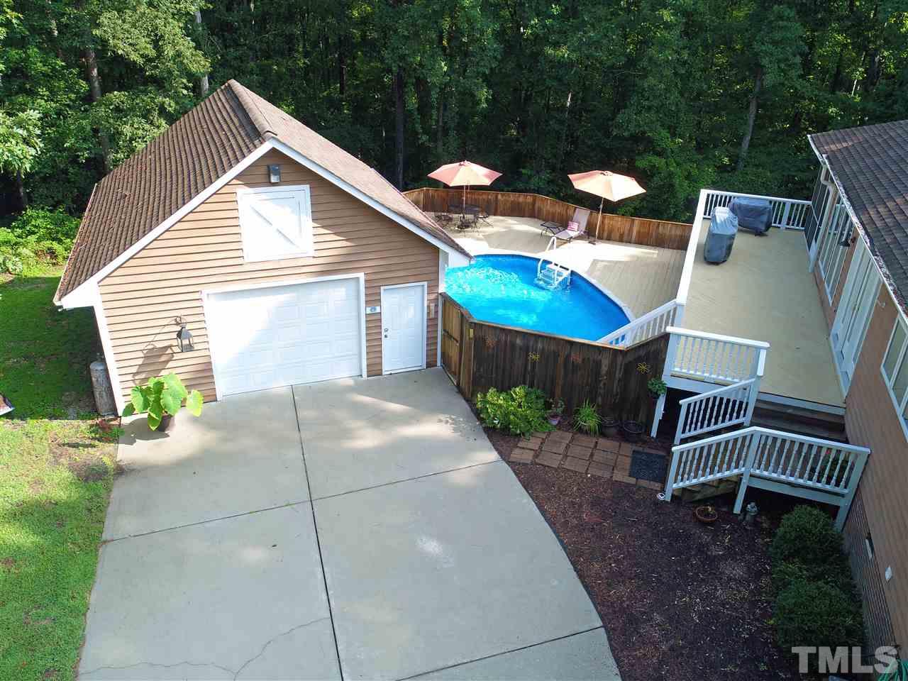 1032 Ridge Drive Clayton, NC 27520 - Photo 3 of 25 a front view of a house with garden