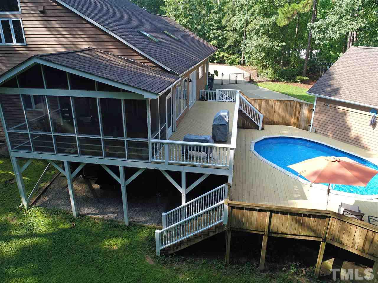 1032 Ridge Drive Clayton, NC 27520 - Photo 22 of 25 a view of a backyard with sitting area