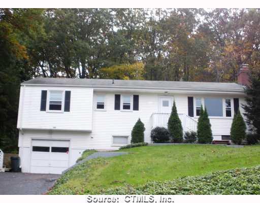 680 West Woods Road Hamden, CT 06518 - Photo 1 of 1 a view of a white house with a yard