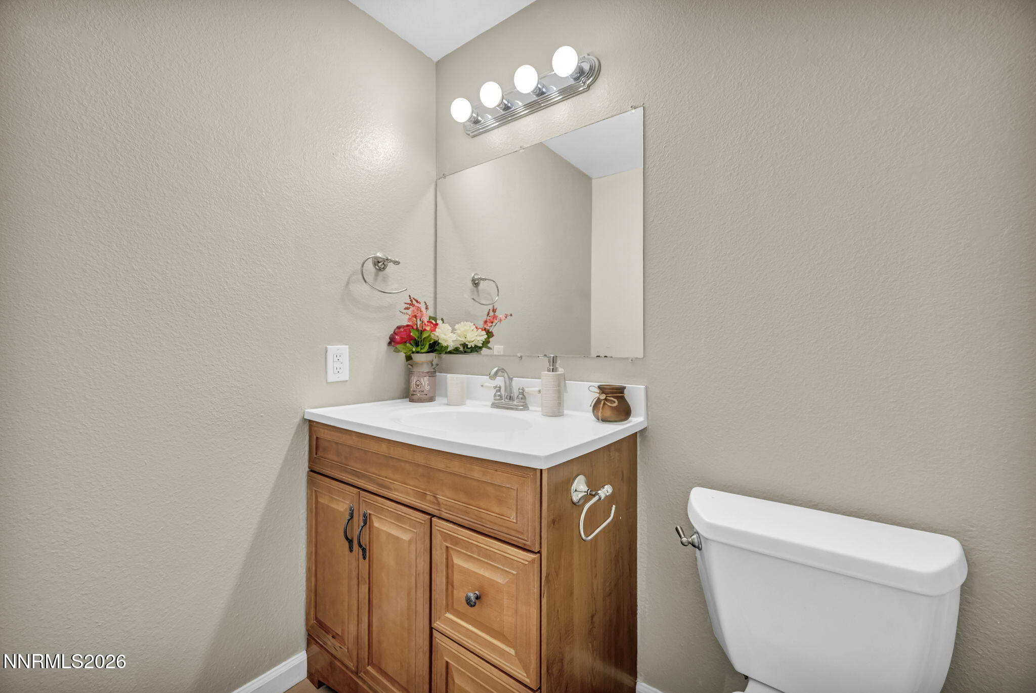 19 Condor Circle Carson City, NV 89701 - Photo 22 of 41 a bathroom with a toilet sink and mirror