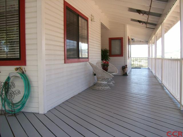 226 Summit Station Road Arroyo Grande, CA 93420 - Photo 3 of 25 a view of a house with wooden floor and chair