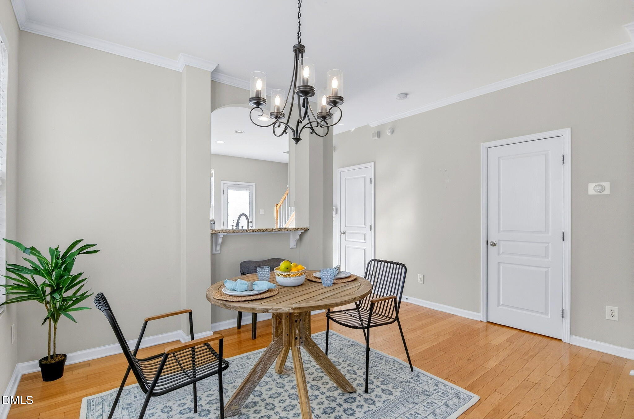 603 Cupola Drive Raleigh, NC 27603 - Photo 8 of 32 a view of a dining room with furniture and wooden floor