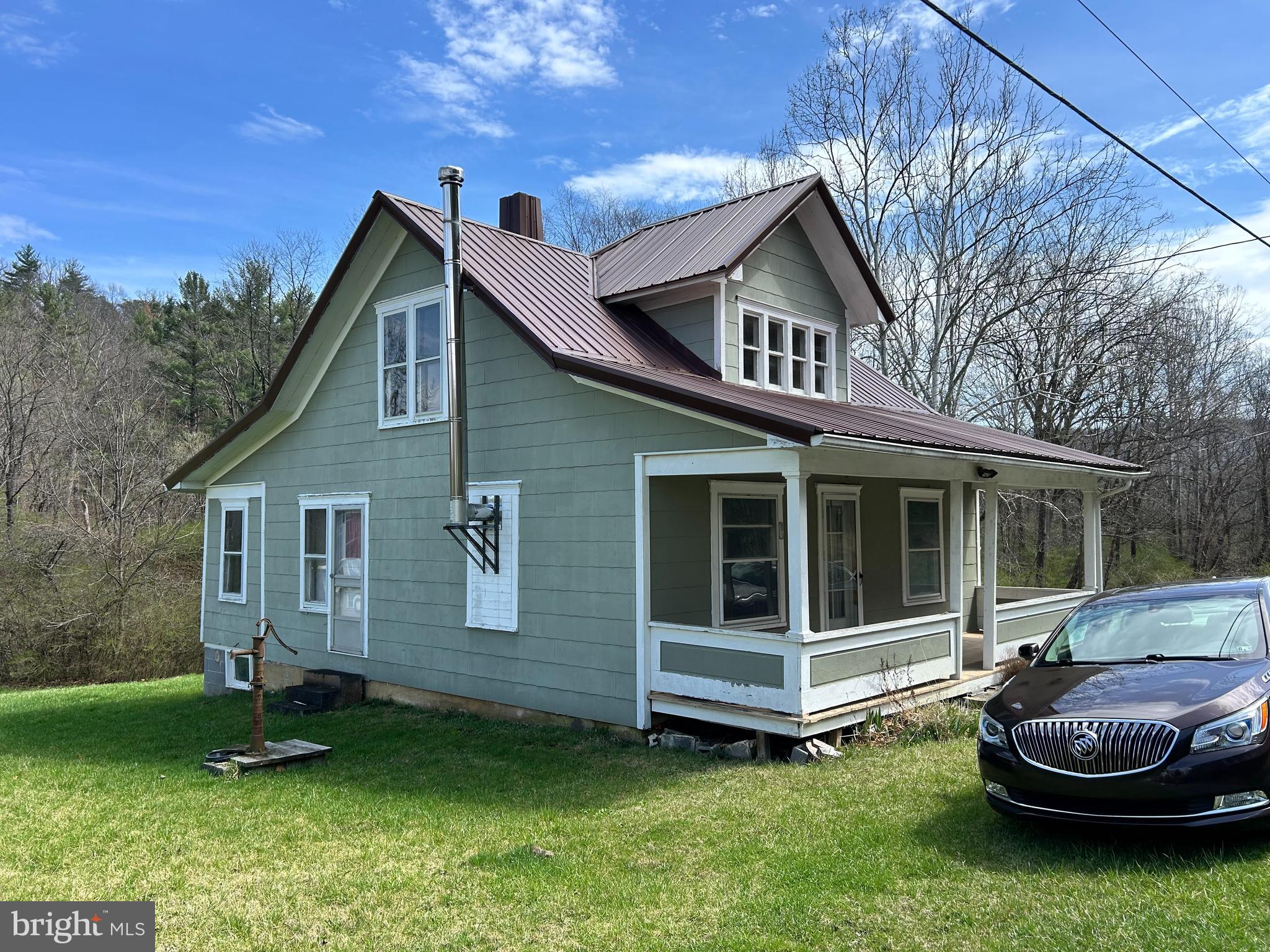 1150 Purcell Road Artemas, PA 17211 - Photo 9 of 19 a view of a house with a yard