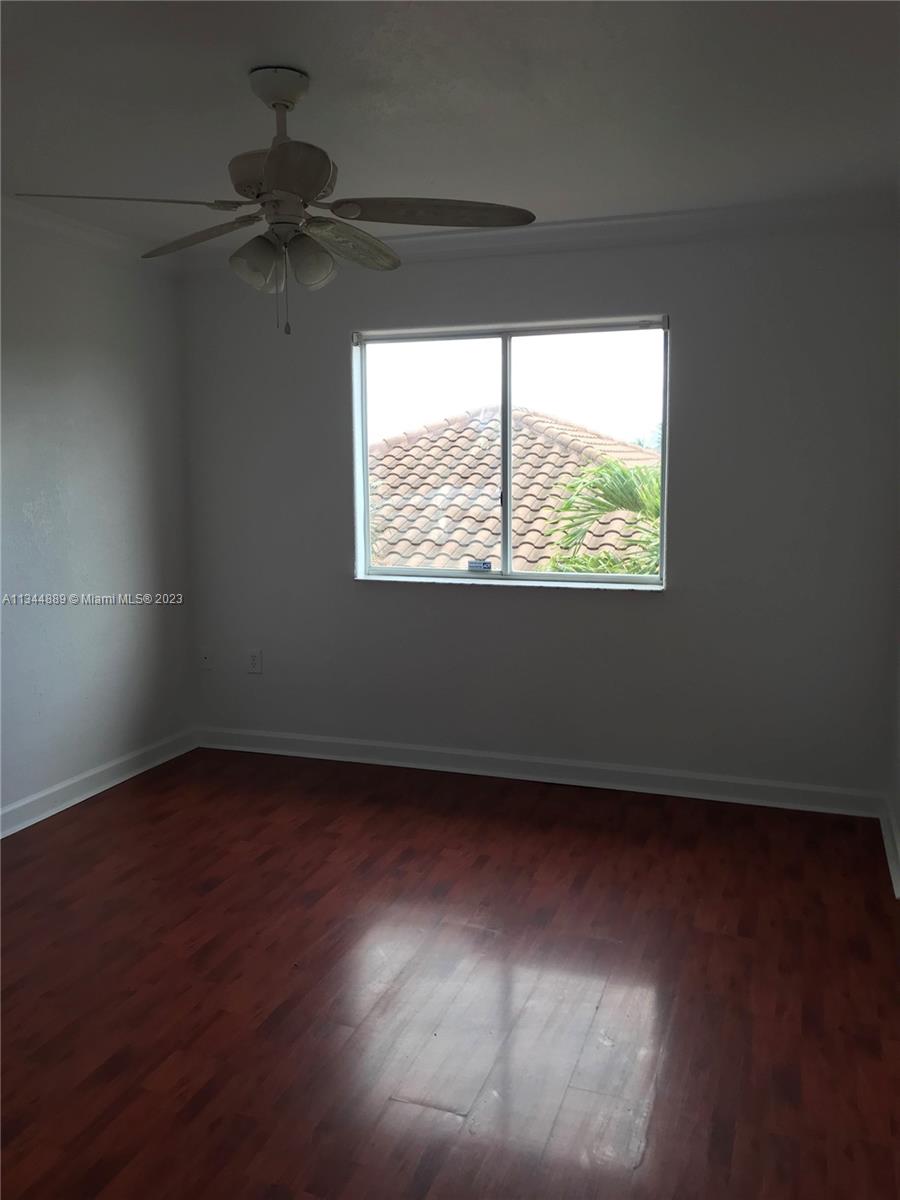 16057 Southwest 53rd Terrace Miami, FL 33185 - Photo 29 of 30 a view of an empty room and a window