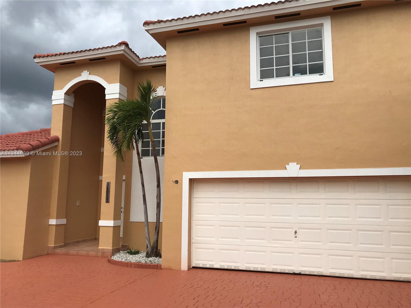 16057 Southwest 53rd Terrace Miami, FL 33185 - Photo 5 of 30 a view of front door