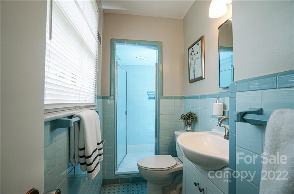 1829 Cathey Road Charlotte, NC 28214 - Photo 33 of 46 a bathroom with a toilet and a sink