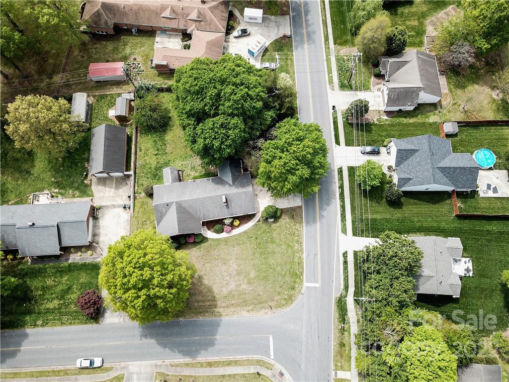 1829 Cathey Road Charlotte, NC 28214 - Photo 42 of 46 an aerial view of a house with a garden and lake view