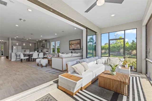 a living room with furniture and a table