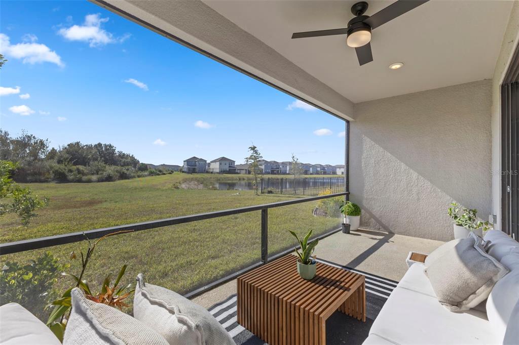 5679 Blue Reef Place Nokomis, FL 34275 - Photo 20 of 46 a view of a balcony with furniture