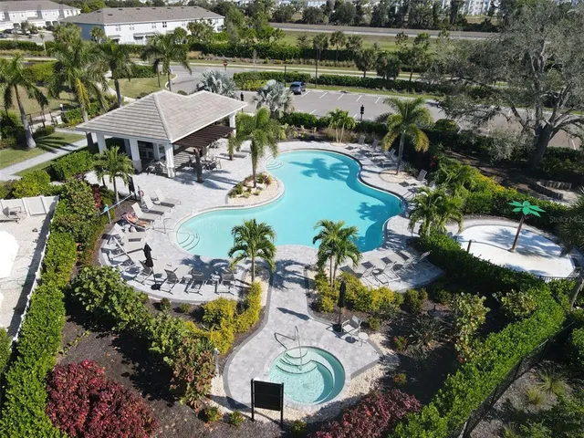 an aerial view of a house with a lake view and lake view