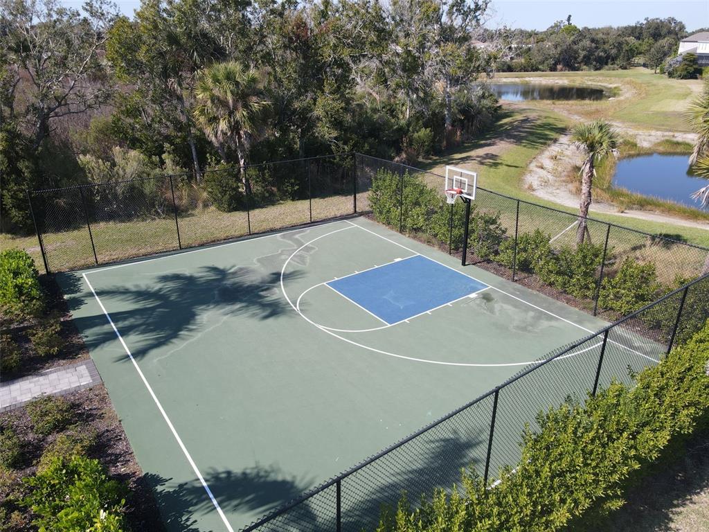 5679 Blue Reef Place Nokomis, FL 34275 - Photo 45 of 46 a view of a tennis court