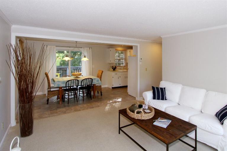77 Sheffield Road Brewster, MA 02631 - Photo 11 of 26 a living room with furniture and a large window
