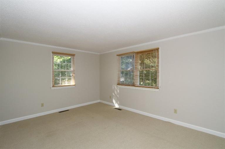 77 Sheffield Road Brewster, MA 02631 - Photo 18 of 26 an empty room with windows