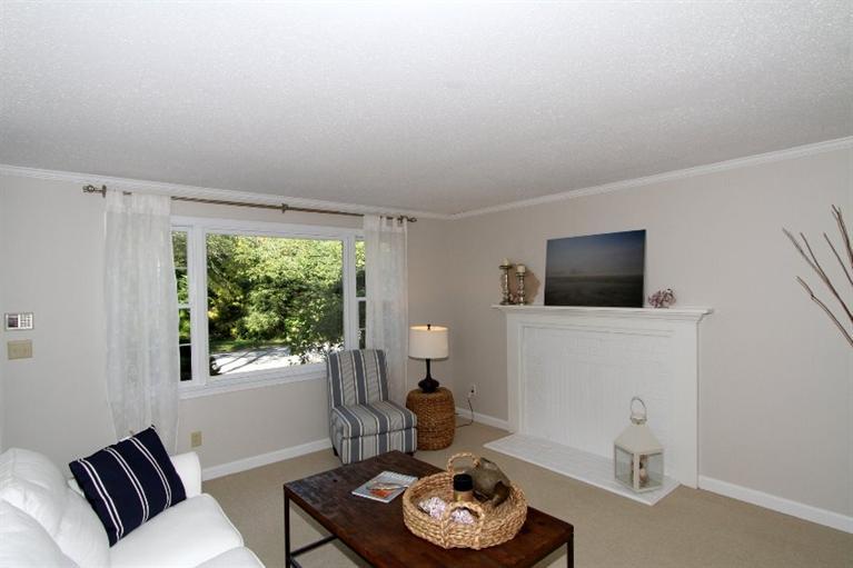 77 Sheffield Road Brewster, MA 02631 - Photo 9 of 26 a living room with furniture and a flat screen tv